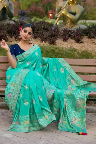 Turquoise pure dola silk jacquard woven saree with blouse