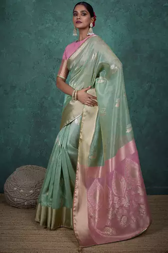 Light green linen blend self woven butta all over, a grand broad patta & sequins woven pallu saree with blouse