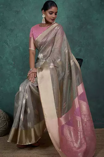 Grey linen blend self woven butta all over, a grand broad patta & sequins woven pallu saree with blouse
