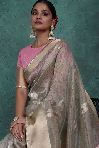 Grey linen blend self woven butta all over, a grand broad patta & sequins woven pallu saree with blouse
