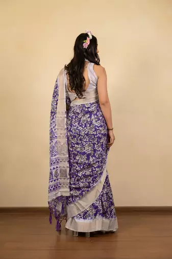 Purple cotton silk abstract print golden zari border saree with unstitched blouse piece