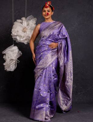 Purple silk blend woven design golden zari border saree with unstitched blouse piece 1