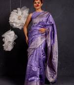 Purple silk blend woven design golden zari border saree with unstitched blouse piece