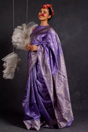 Purple silk blend woven design golden zari border saree with unstitched blouse piece