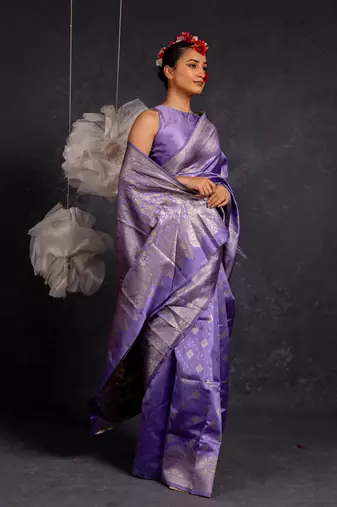 Purple silk blend woven design golden zari border saree with unstitched blouse piece
