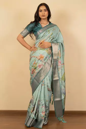 Light sea green cotton silk blend floral print zari woven border saree with unstitched blouse piece