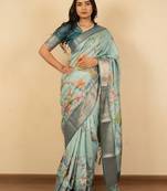 Light sea green cotton silk blend floral print zari woven border saree with unstitched blouse piece