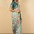 Light sea green cotton silk blend floral print zari woven border saree with unstitched blouse piece