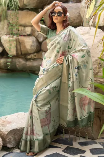 Light olive green cotton silk blend floral print zari woven border saree with unstitched blouse piece