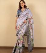 Light lavender cotton silk blend floral print zari woven border saree with unstitched blouse piece