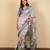 Light lavender cotton silk blend floral print zari woven border saree with unstitched blouse piece