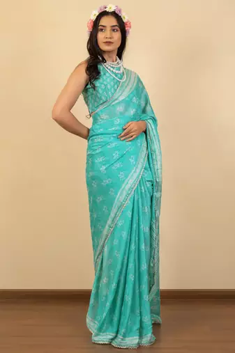 Light lavender chiffon floral print zari work golden lace saree with unstitched blouse piece