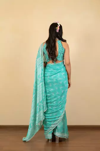 Light lavender chiffon floral print zari work golden lace saree with unstitched blouse piece