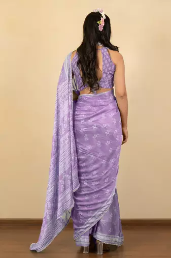 Light purple chiffon floral print zari work golden lace saree with unstitched blouse piece