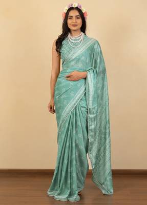 Dusty teal chiffon floral print zari work golden lace saree with unstitched blouse piece 1