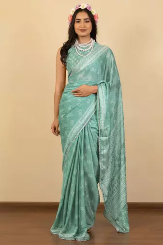 Dusty teal chiffon floral print zari work golden lace saree with unstitched blouse piece