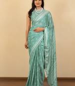 Dusty teal chiffon floral print zari work golden lace saree with unstitched blouse piece