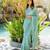 Dusty teal chiffon floral print zari work golden lace saree with unstitched blouse piece