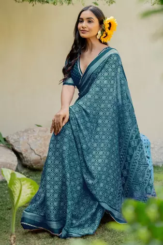 Dark rama blue chiffon bandhani checks print lace border saree with unstitched blouse piece