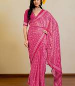 Bright pink chiffon bandhani checks print lace border saree with unstitched blouse piece