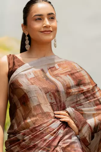 Dusty rust chiffon geometric printed saree with unstitched blouse piece