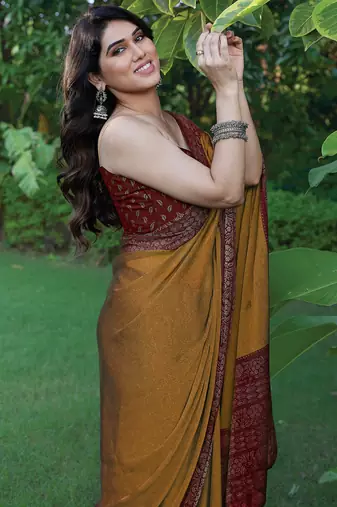 Dark mustard chiffon floral printed saree with unstitched blouse piece