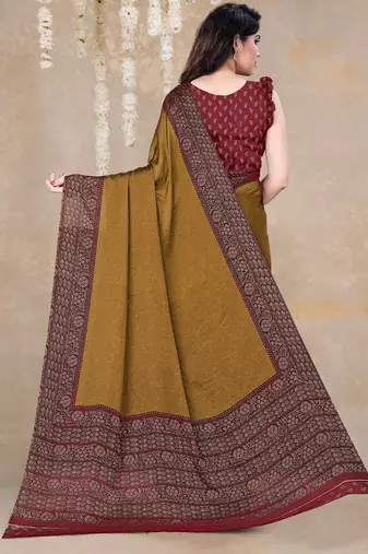 Dark mustard chiffon floral printed saree with unstitched blouse piece