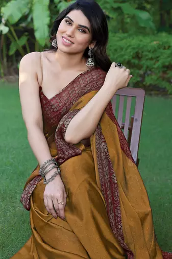 Dark mustard chiffon floral printed saree with unstitched blouse piece