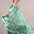 Green chiffon floral print saree with unstitched blouse piece