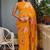 Bright orange chiffon floral print golden zari line border saree with unstitched blouse piece