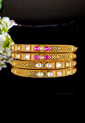Elegant kundan & ruby gold bangles set 1