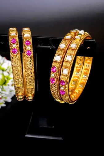 Elegant kundan & ruby gold bangles set