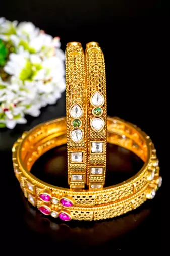 Elegant kundan & ruby gold bangles set