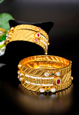 Majestic kundan & pearl antique bangles 1