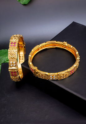 Regal elephant motif gold bangles with enamel detailing 2