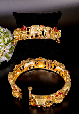 Regal elephant motif gold bangles with enamel detailing 5
