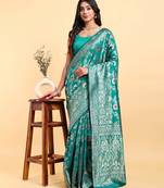 Ocean green jacquard zari woven patola saree with blouse piece