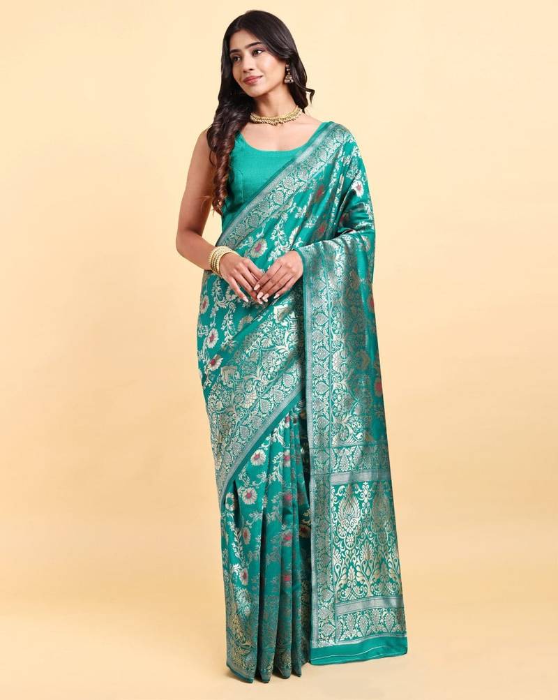 Ocean green jacquard zari woven patola saree with blouse piece