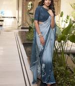 Effortless Elegance Weightless Marble-Print Saree with Delicate Lace Border