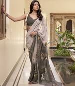 Effortless Elegance Weightless Marble-Print Saree with Delicate Lace Border