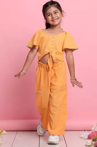 Girls' orange co-ord set     front-knot button top & relaxed fit trousers