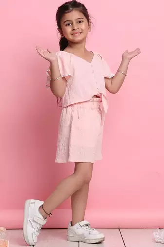 Girls' light peach co-ord set     front-knot top & high-waisted shorts