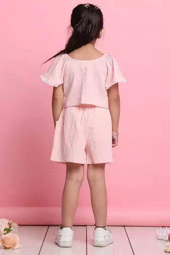 Girls' light peach co-ord set     front-knot top & high-waisted shorts