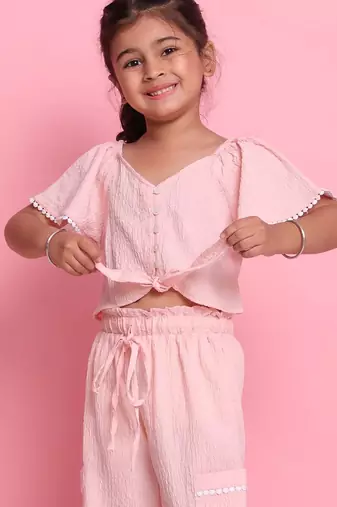 Girls' light peach co-ord set     front-knot top & relaxed fit trousers