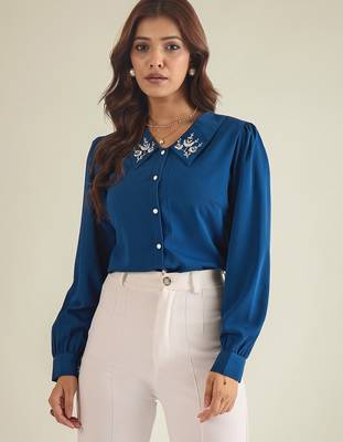 Blue collared shirt with contrast embriodery 1