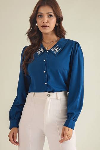 Blue collared shirt with contrast embriodery