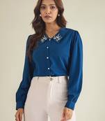 Blue collared shirt with contrast embriodery