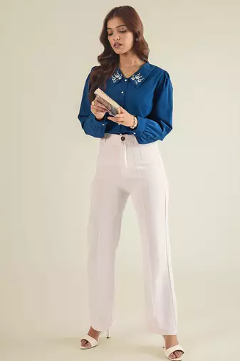 Blue collared shirt with contrast embriodery