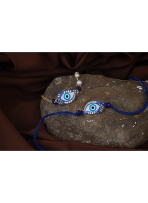 Handcrafted combo of couple pair evil eye protection rakhi for bhaiya bhabhi with roli chawal and written greeting note. 1
