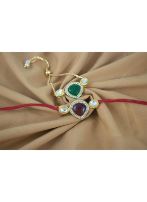 Combo of kundan rakhi and bracelet set for bhaiya bhabhi with roli chawal and written greeting note. 1